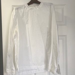 White ruffle hem top